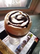 Three layers of creative coffee embellishes romantic Valentine's Day.