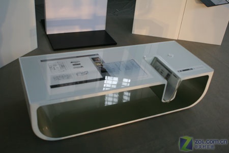 The virtual world is built on the coffee table in the first show of Microsoft holographic games.
