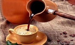 A cup of coffee with a cup of water Arabs are particular about drinking coffee.